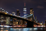 Fototapeta  - Brooklyn bridge and Manhattan skyline at night in New York City