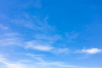 Wall Mural - light and soft clouds floating over the blue sky. nice weather in the summer atmosphere vast outdoor