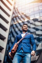 Portrait of handsome businessman outdoors