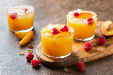 Canvas Print - Summer refreshing drink, beverage, cocktail with peach and raspberry