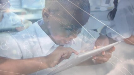 Poster - Animation of network of connections over african american schoolboy using tablet