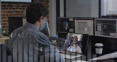 Poster - Animation of financial graphs over caucasian man in face mask having video call in office