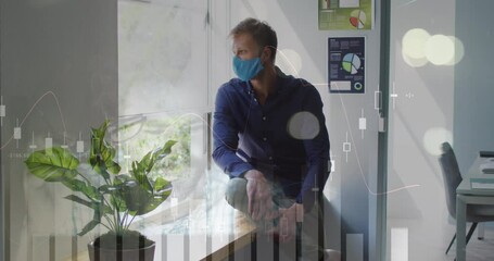 Poster - Animation of financial graphs over caucasian man in face mask sitting at window