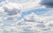 © Prikhodko - White clouds on the blue sky, bright background of the summer sky.