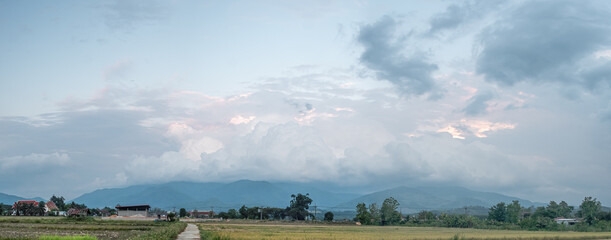 Wall Mural - storm clouds are forming over the top of the mountain.