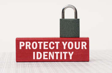 Poster - On the reports there is a red block with the inscription - Protect Your Identity and a lock.
