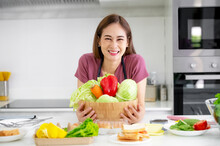 Asian Women Smiling In Kitchen Cooking Salad Vegetable Eat Healthy