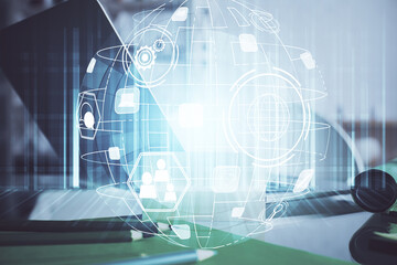 Poster - Computer on desktop with social network theme icon. Multi exposure. Concept of international connections.