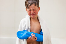 Sad Boy With Tears On Face In Bathroom