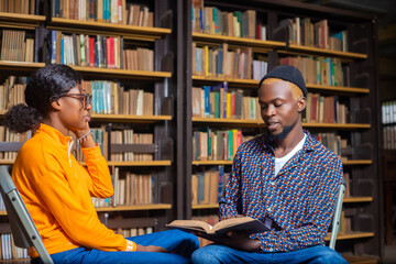 Wall Mural - students with books preparing to exam in library