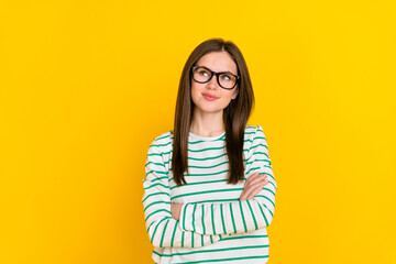 Wall Mural - Photo of adorable interested businesswoman look blank space brainstorming isolated on yellow color background