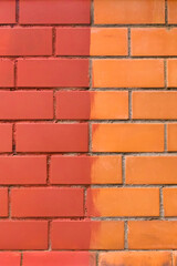 Brick wall paint two colors red and brown or orange abstract urban background design art texture