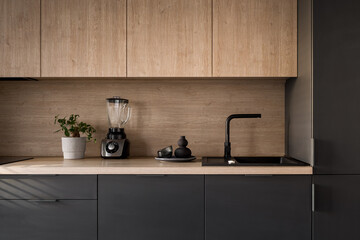 Wooden kitchen countertop with black sink