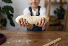 Girl Holding A Finished Clean Dough