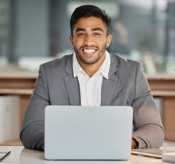 Aufkleber - Believe me, you havent seen a brand like ours. Shot of a young businessman using a laptop in a modern office.
