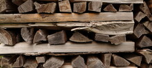 Stacked Dry Firewood As A Background