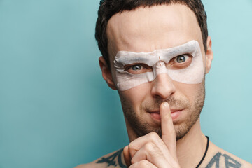 Wall Mural - Close up portrait of a brunette mid aged shirtless man