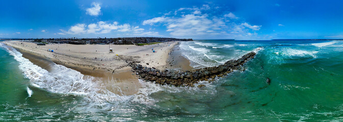 Wall Mural - Ocean Beach, San Diego, looking at the Breakwater in a Panorama that also shows the Historic Fishing Pier