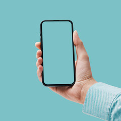 Woman showing a smartphone with blank screen