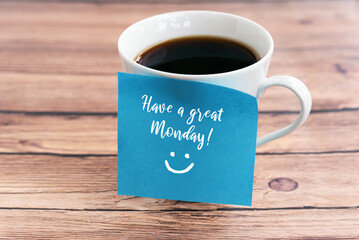Wall Mural - Happy Monday Greeting on sticky note on coffee cup