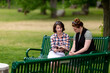 © Lydia - Two women doing a Bible study on a park bench