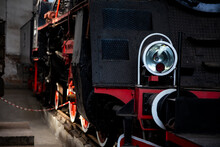 A Steam Locomotive Standing In The Building Of The Historic Locomotive Shed. The Shot Was Taken In Natural Lighting Conditions.