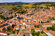 Aerial View Of Residential Areas Of French Commune Of Craponne-sur-Arzon With Similar Brownish Roofs On Summer Day, Haute-Loire Department.