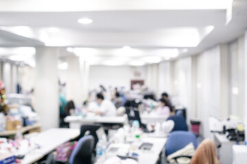 Employee at workshop and office blur background