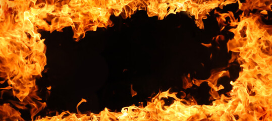 Wall Mural - Burning flame frame on black background