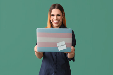 Poster - Happy transgender programmer with laptop on green background