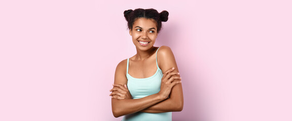 Wall Mural - Portrait of beautiful African-American woman on pink background