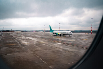 Wall Mural - view through window of aircraft during flight