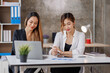 © David - Cropped shot of Asian Business woman diverse coworkers working together in the boardroom, brainstorming, discussing, and analyzing business report strategy collaboration.