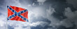 Confederate flag on a cloudy sky