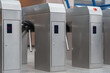 © New Africa - Many modern turnstiles, closeup view. Fare collection system