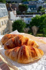 Two fresh baked butter croissants from French bakery