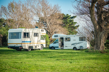 motorhome on a camping ground, caravan vacations, campervan trip