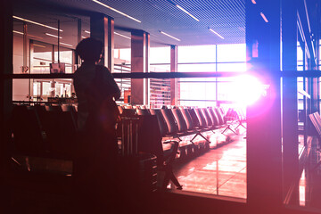 Wall Mural - The interior of the lobby airport or office building at sunset - the light comes through the glass and spreads the room out - red, blue colors