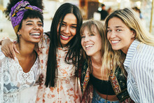 Multiracial Happy Friends Having Fun Outdoor At Beach Party - Soft Focus On Center Girls Face