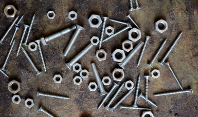 Wall Mural - old nails screws and bolts on a background
