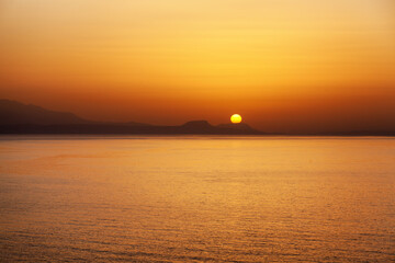 Wall Mural - Beautiful colorful sunset over sea.