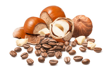 Wall Mural - pile of hazelnuts and coffee beans isolated on white background. whole and pieces