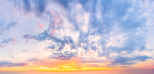 Wall Mural - Light cirrus clouds in the blue sky during dawn sunset