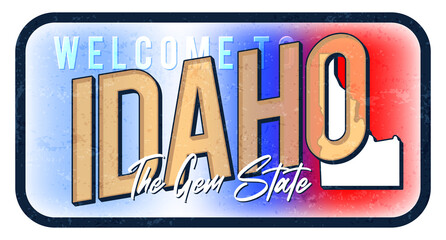 Wall Mural - Welcome to Idaho vintage rusty metal sign vector illustration. Vector state map in grunge style with Typography hand drawn lettering