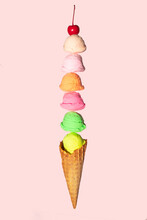 Pastel Ice Cream Balls And Cherry In Cone On Light Pink Background. Creative Food Concept. Minimalistic Sweets Composition. Sunny Summer Day Idea.