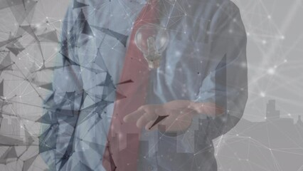 Poster - Animation of data processing over caucasian businessman with lightbulb