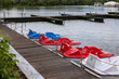 pleasure pedal boat stands on the pier