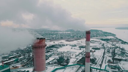 Wall Mural - Factory smokestack emissions, climate change and global warming for the environment concept. Aerial view