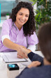 © auremar - doctor shaking hands to the female patient in the office