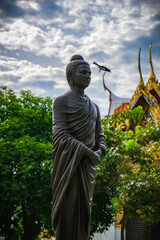 Wall Mural - Buddha statues in various gestures at the Bodhi tree courtyard in Wat Benchamabophit.